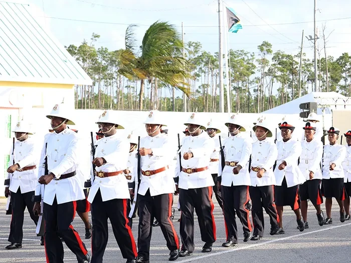 NEW OFFICERS SWORN IN - Ninety-six (96) recruits from the 'D, E & F' Squads graduated at a ceremony held at Grand Bahama Sports Complex under the theme "Stewards of Justice, Empowered to Serve." In attendance were distinguished guests, including the Minister of National Security, the Hon. Wayne Munroe; Commissioner of Police, Clayton Fernander; Assistant Commissioner of Police, Shanta Knowles; Minister for Grand Bahama, the Hon. Ginger Moxey; Parliamentary Secretary within the Ministry for Grand Bahama, Kingsley Smith; along with other esteemed officials, and the family members and friends of the graduates. The ceremony celebrated the recruits' successful completion of six months of intense training. Special awards, including the Commandant’s Award and Baton of Honour, were presented to top performers. <br/>  (BIS Photos/Jamika Culmer)