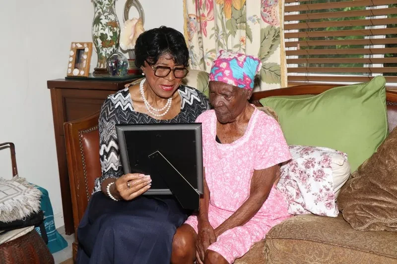 Oldest living Bahamian Millie Robinson, 110 years old, receives a birthday visit from the Governor General