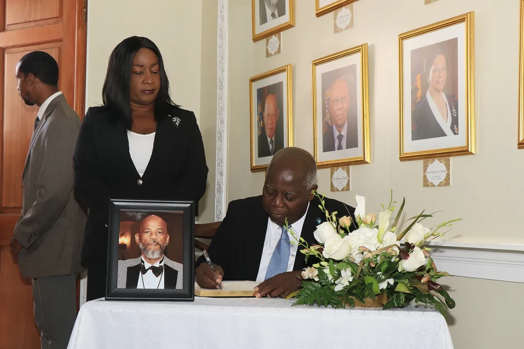 Prime Minister Philip Davis pays respects to the late Rodney Moncur, JP, former Senator Prime Minister Philip Davis pays respects to the late Rodney Moncur, JP, former Senator