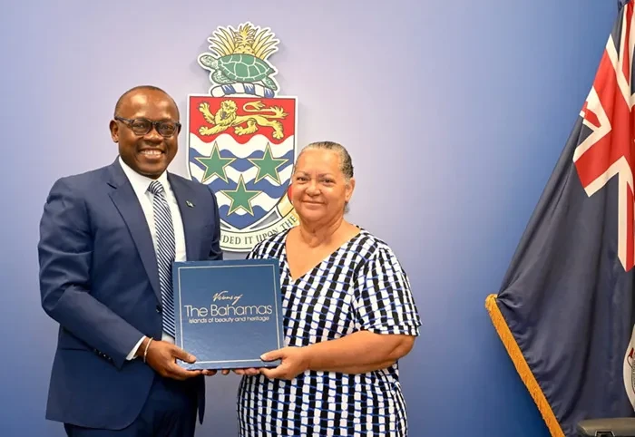 DPM Cooper attends a tourism conference in Cayman Islands and pays a courtesy call on Premier Juliana O'Connor-Connolly