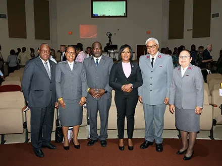 CELEBRATING WITH THE ARMY – Minister for Grand Bahama, Hon. Ginger Moxey poses for a photo with officials from the Salvation Army during a special 40th anniversary service on Friday, March 14, 2025 at Freeport Bible Church. Standing with Minister Moxey are (from left) Felix Stubbs, Chairman of the Advisory Board of the Salvation Army (Freeport); Major Aldene Meo, Divisional Director of Women’s Ministries; Major Roodolph Meo, Divisional Commander for The Bahamas, Turks & Caicos Division; Minister Ginger Moxey; Major Hendrik Sumter and Eugenia Sumter.