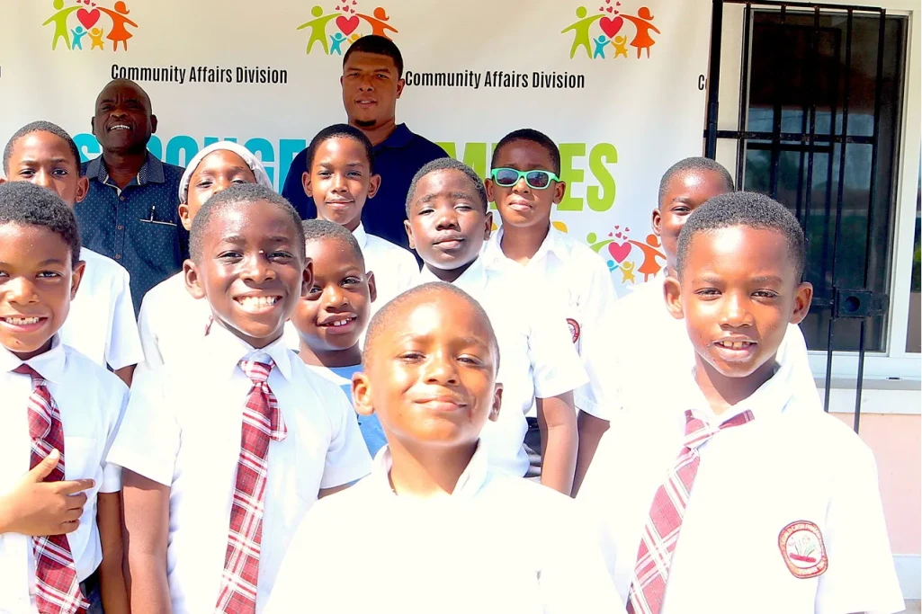 Boys enjoy playing board games, celebrating International Day of the Boy Child