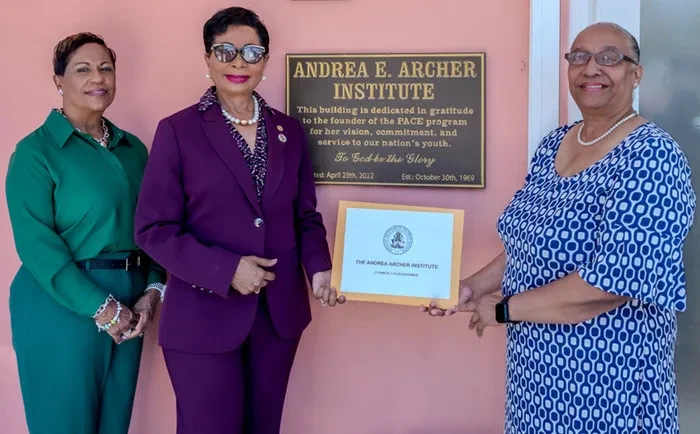 Mrs. Ann Marie Davis makes a donation of food vouchers to the Andrea E. Archer Institute (formerly PACE Bahamas)