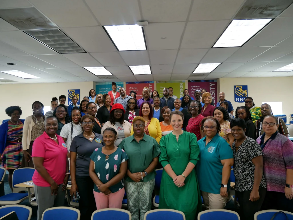 Fanny Rotino, Global Programme Officer for the ITU and workshop participants pose for group photo.