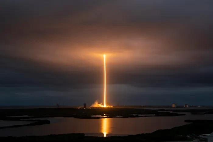 The Falcon 9 as it launches from Port Canaveral.