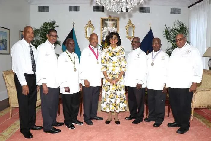 The Governor General welcomes Bahamas Hotel Training College's earliest alumni -- Class of 1974