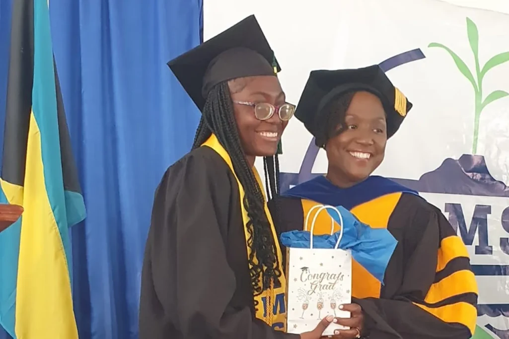 Valedictorian Andricka Saimphilus with BAMSI President Dr. Raveenia Roberts-Hanna