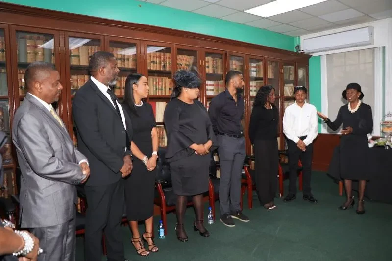 The Deputy to the Governor General pays last respects at Lie-in-State of Naomi Seymour