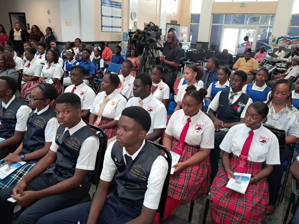 Minister of Education and Technical & Vocational Training, the Hon. Glenys Hanna-Martin addresses students during a Meet & Greet event celebrating the Bahamas Public Schools Student of Distinction Society. The event was held on Monday, 11th November in the Dame Ivy Dumont building foyer of the Ministry of Education and Technical & Vocational Training on University Drive. (BIS Photos/Ulric Woodside)