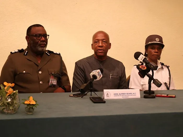 SPEAKING TO THE MEDIA – Minister for Immigration and National Insurance, the Hon. Alfred Sears met with members of the media in Grand Bahama on Thursday, November 7, 2024 to discuss his meetings with NIB and Immigration in Grand Bahama.  Joining Minister Sears at the press conference were Acting Director of Immigration, Rudolph Ferguson and Assistant Director of Immigration/Northern Region, Greta Knowles.  (BIS Photo/Andrew Miller) SPEAKING TO THE MEDIA – Minister for Immigration and National Insurance, the Hon. Alfred Sears met with members of the media in Grand Bahama on Thursday, November 7, 2024 to discuss his meetings with NIB and Immigration in Grand Bahama.  Joining Minister Sears at the press conference were Acting Director of Immigration, Rudolph Ferguson and Assistant Director of Immigration/Northern Region, Greta Knowles.  (BIS Photo/Andrew Miller)