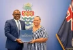 DPM Cooper attends a tourism conference in Cayman Islands and pays a courtesy call on Premier Juliana O'Connor-Connolly
