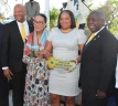 L-r Housing and Urban Renewal Minister Keith Bell, Dame Marguerite Pindling, New Home Recipient, and Prime Minister Philip Davis