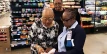 The Consumer Affairs Unit, upon implementation of the new VAT rate, April 1, deployed price inspectorate teams at  Solomon's Supercenter - Old Trail; Cost Right - Old Trail; Buy 4 Less - Blue Hill Road; Budget Meat - Faith Avenue; Super Value - Nassau Street; John Chea - Boyd Road.  Pictured, a price inspector assists customers at Solomon's and Cost Right.