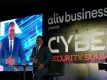 Minister of Economic Affairs, Senator the Hon. Michael Halkitis delivering welcome remarks at the ALIV Business Cyber Security Summit 2025