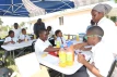Boys enjoy playing board games, celebrating International Day of the Boy Child