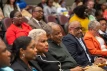 Sir Franklyn Wilson and Sharon Lady Wilson; Minister of Education and  Technical & Vocational Training, the Hon. Glenys Hanna Martin; former Prime Minister, the  Most Honourable, Dr. Hubert Minnis; and other esteemed members of the audience observe the  research presentations.